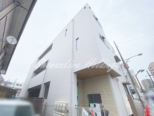 藤沢市藤沢のアパートのエントランス