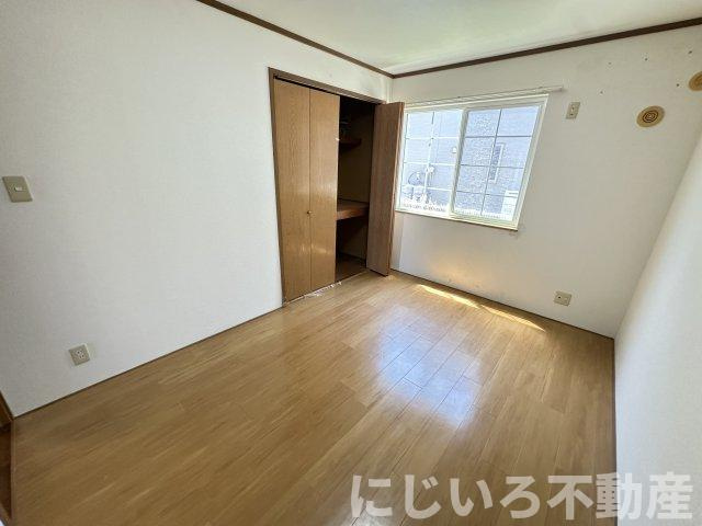 阿南市見能林町貞成のアパートの居間・リビング