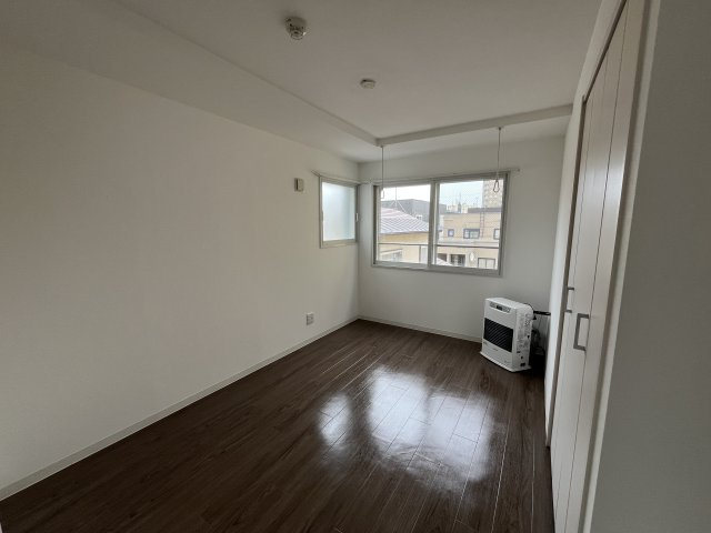 札幌市豊平区月寒東五条５丁目の賃貸マンションの居間・リビング