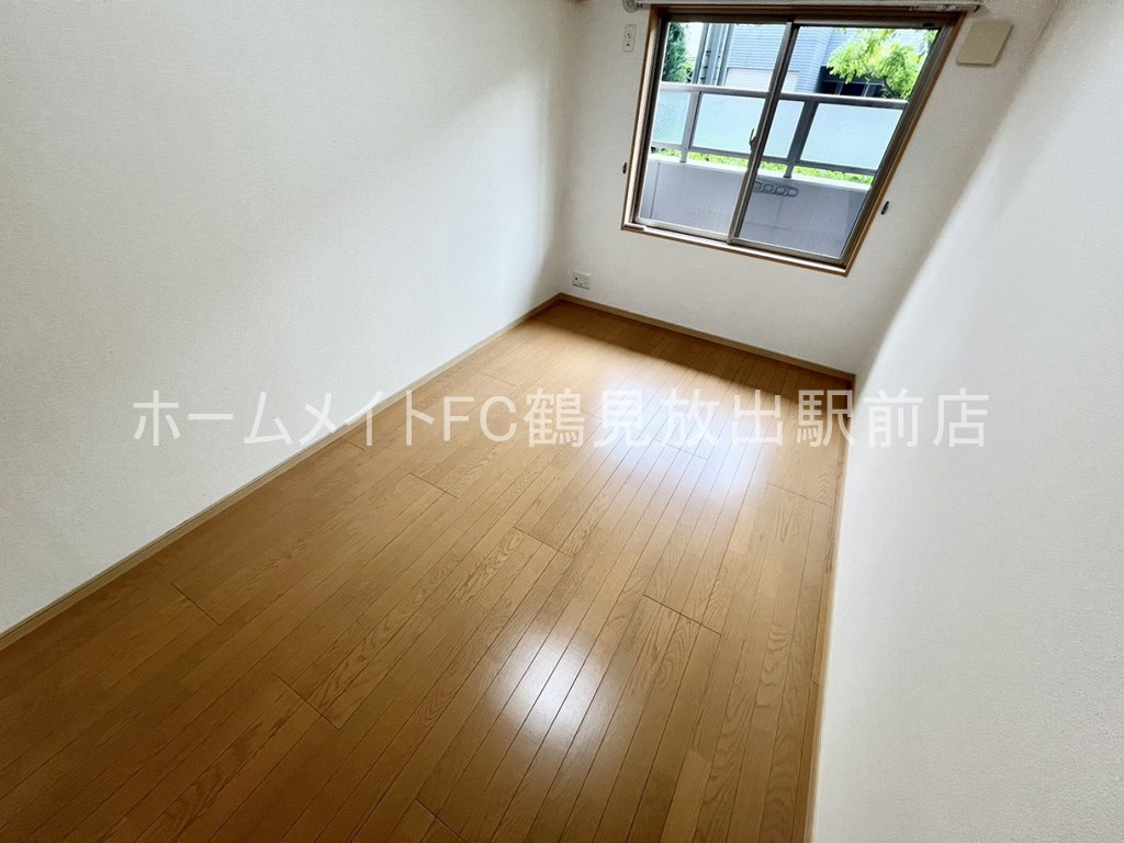 大阪市鶴見区緑２丁目の賃貸マンションの洋室