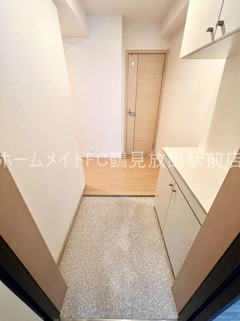 大阪市鶴見区緑２丁目の賃貸マンションの玄関