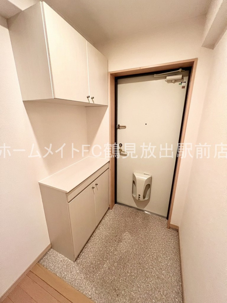 大阪市鶴見区緑２丁目の賃貸マンションの玄関