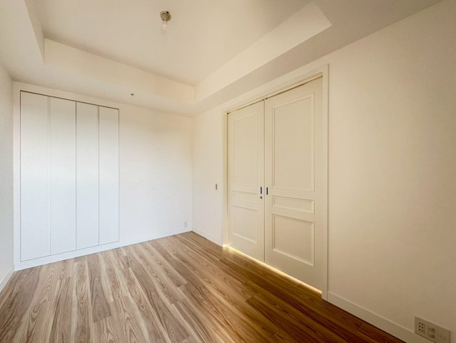 グラングリーン大阪THE NORTH RESIDENCE　扇町小学校の寝室|洋室