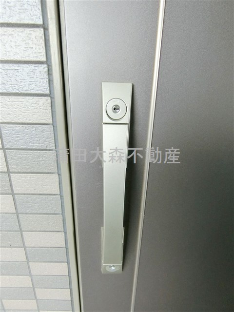 ルーブル仲六郷弐番館の玄関