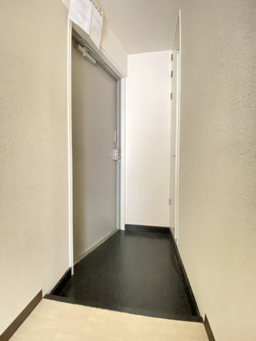 コンフォート岸部の玄関