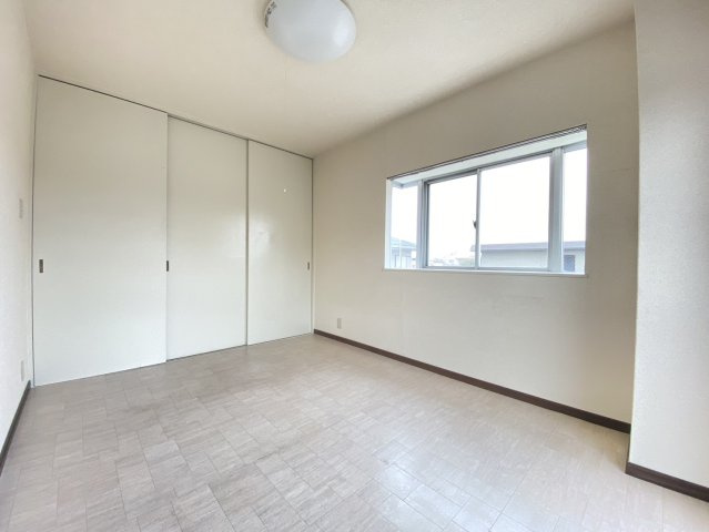 コンフォート岸部の寝室