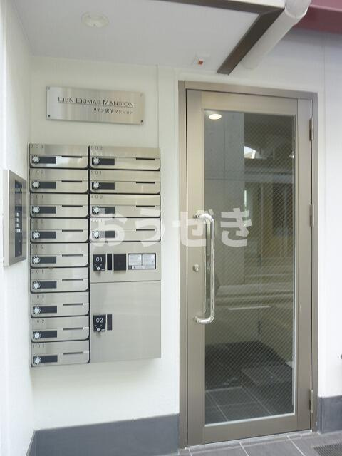 リアン駅前マンションのエントランス| 