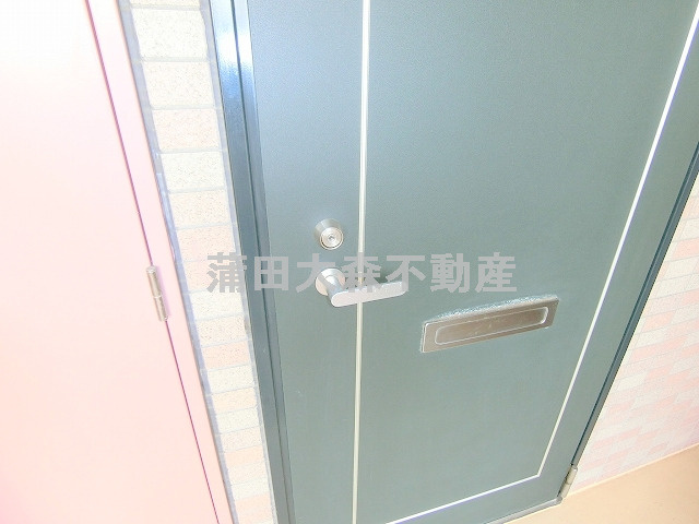 シンシア大森本町の玄関