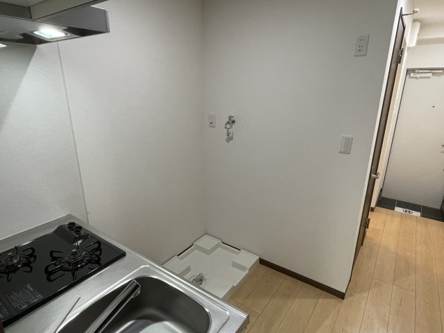 稲城市東長沼のアパートのキッチン
