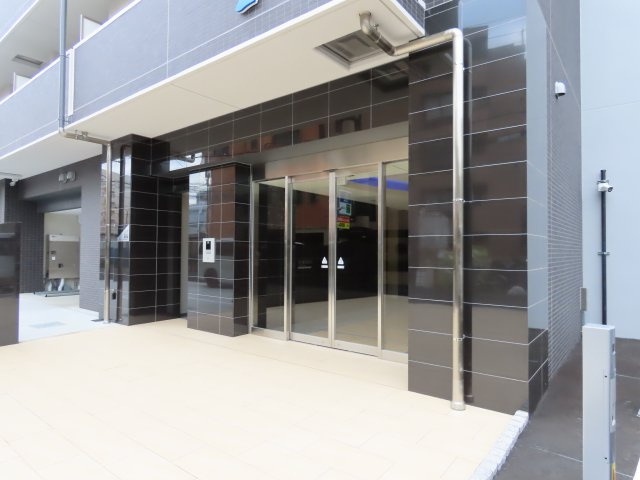 大阪市淀川区十三本町２丁目の賃貸マンションのロビー