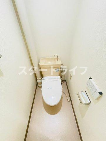大阪市淀川区木川東３丁目の賃貸マンションのトイレ