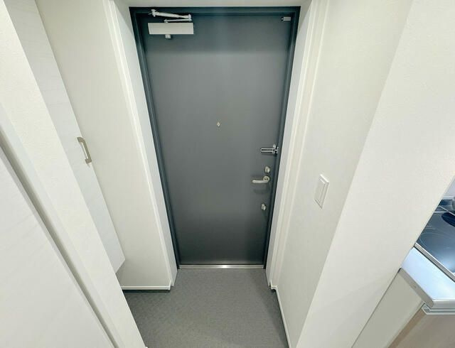 マイナビＳＴＡＹアーバンスイート町屋リバーシティの玄関