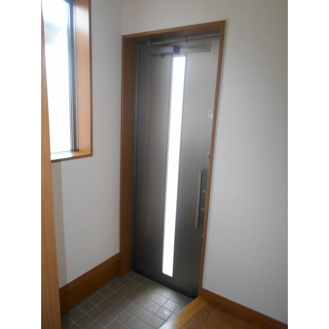 加納南陽町貸家の玄関