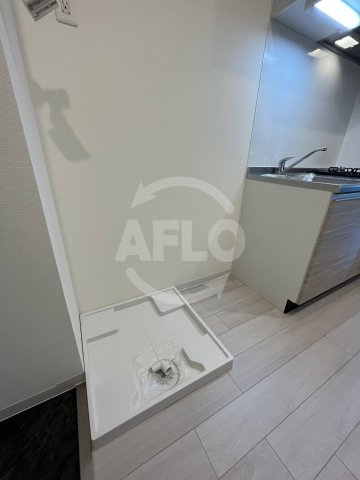 フォーリアライズ弁天町クロスの洗面所|フォーリアライズ弁天町クロス　洗濯機置き場