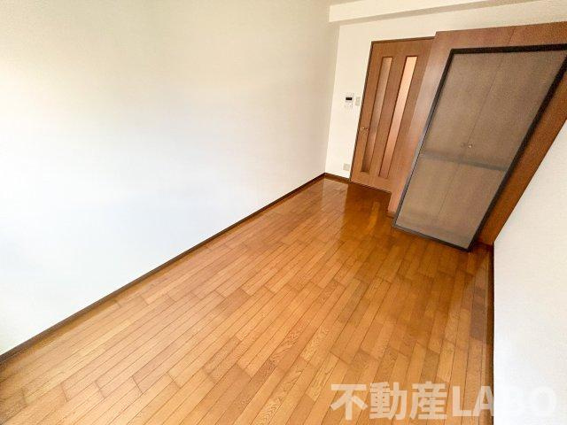 コスモコート大南の洋室