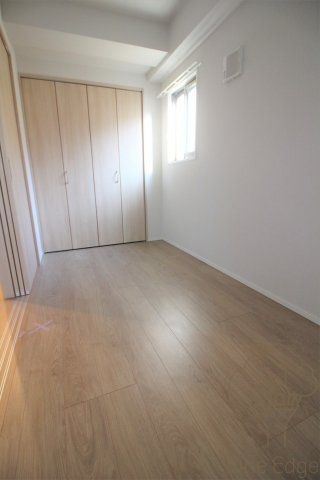 ハイデンス梅ヶ枝の寝室