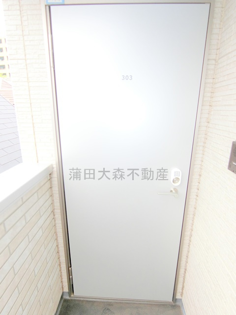 ソレイユ多摩川の玄関