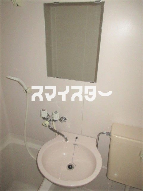 日野市東豊田４丁目のアパートの洗面所