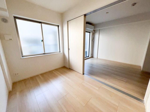 リアライズ長居公園通の寝室