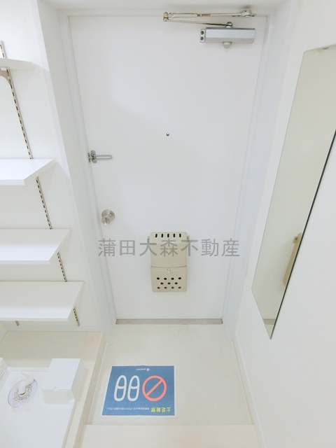 日興パレセゾン鵜の木の玄関