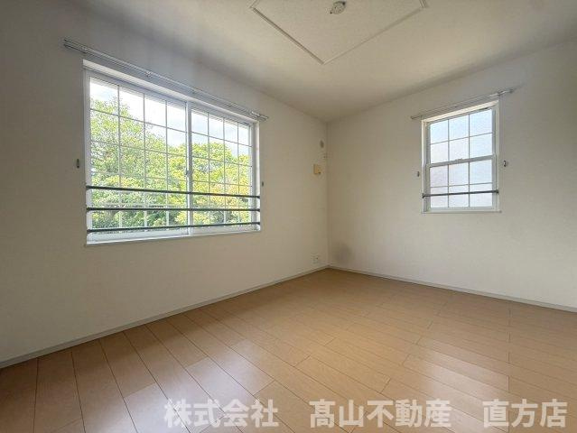 直方市大字頓野のアパートの寝室
