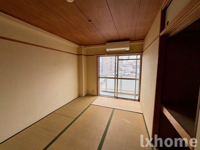 明香マンションの寝室