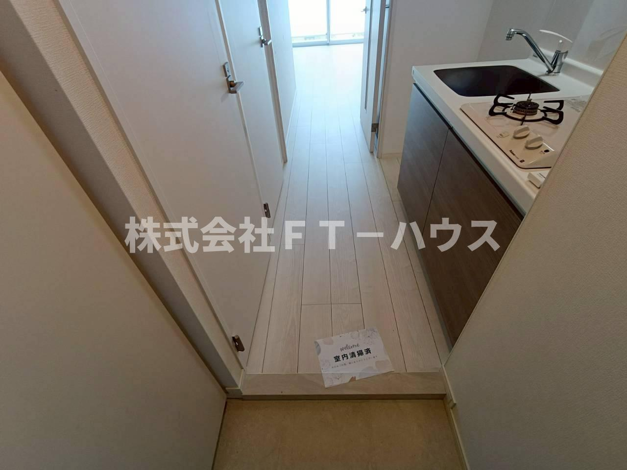 ケイディーエックスレジデンス原木中山の玄関