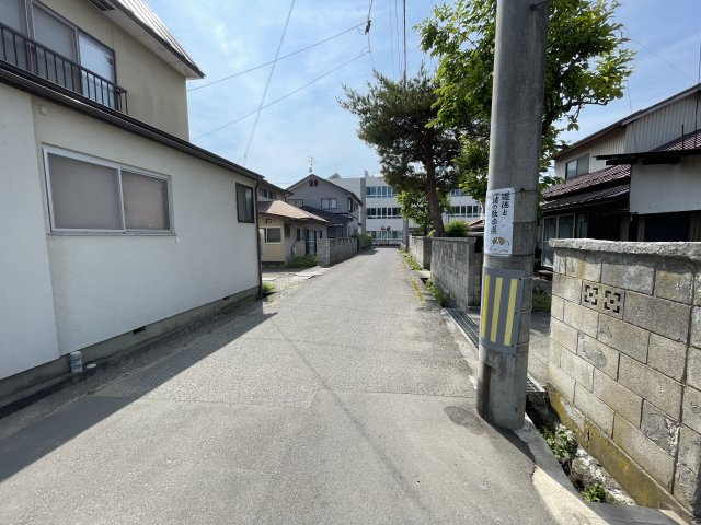 新築戸建・新築建売　会津若松市行仁町　行仁小学校・第一中学校の前面道路含む現地写真