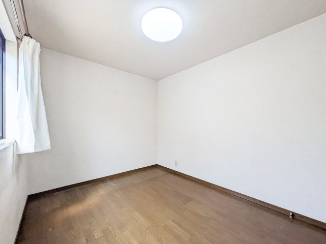 深江南町2丁目中古戸建の洋室|1階洋室約6.0帖写真