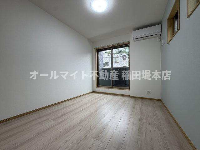 川崎市多摩区南生田７丁目のアパートの居間・リビング