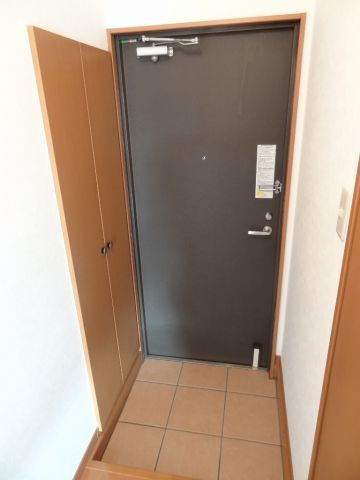 コンチェルト御薗宇の玄関