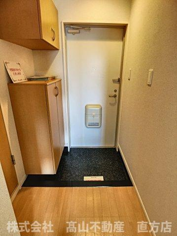 直方市大字頓野のアパートの玄関