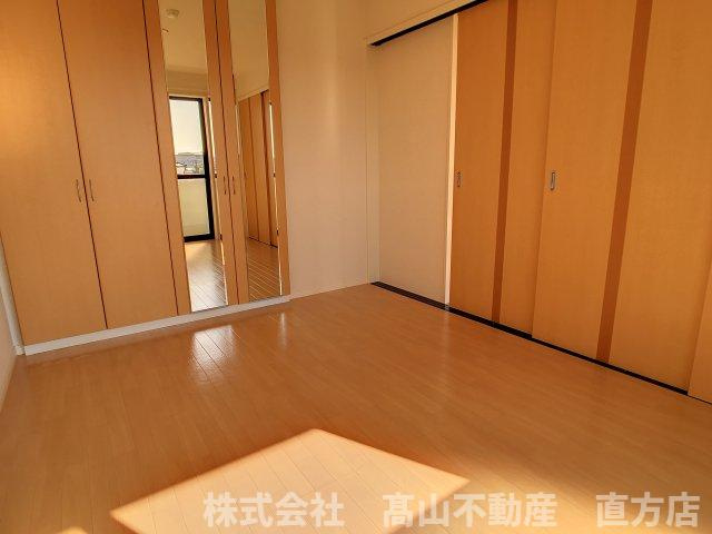 直方市大字頓野のアパートの寝室
