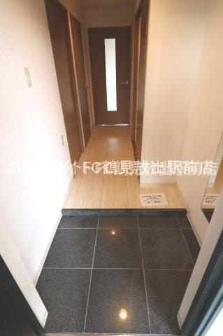 大阪市鶴見区今津中４丁目の賃貸マンションの玄関