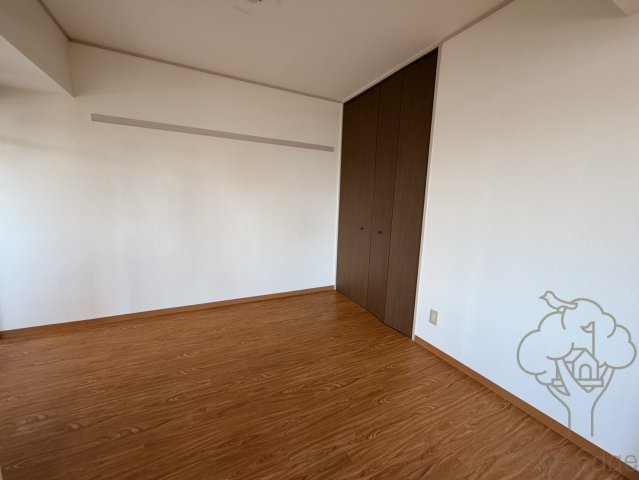 アルプス西梅田の寝室