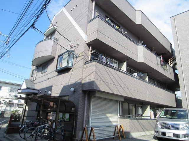 かいづかファミリア１の外観|タイル貼りのきれいなマンション