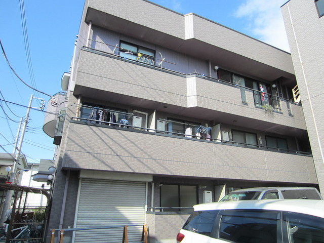 かいづかファミリア１の外観|タイル貼りのきれいなマンション