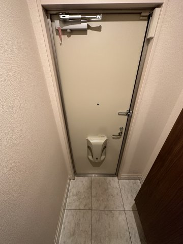 川崎市多摩区菅３丁目のアパートの玄関
