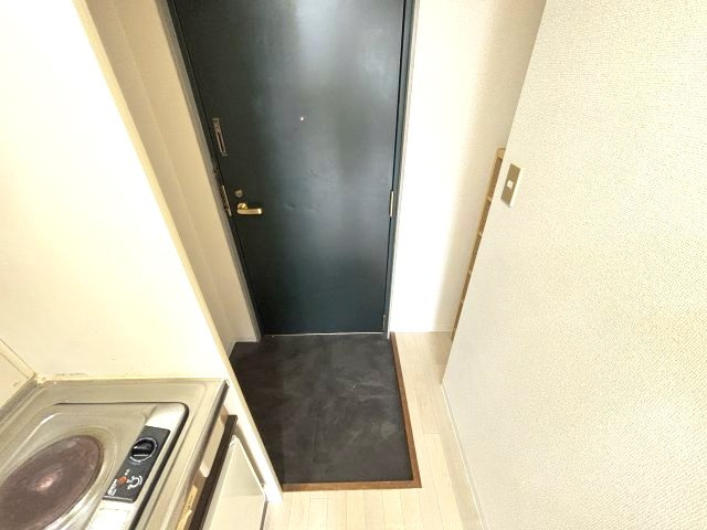 ルミエール旭ヶ丘の玄関