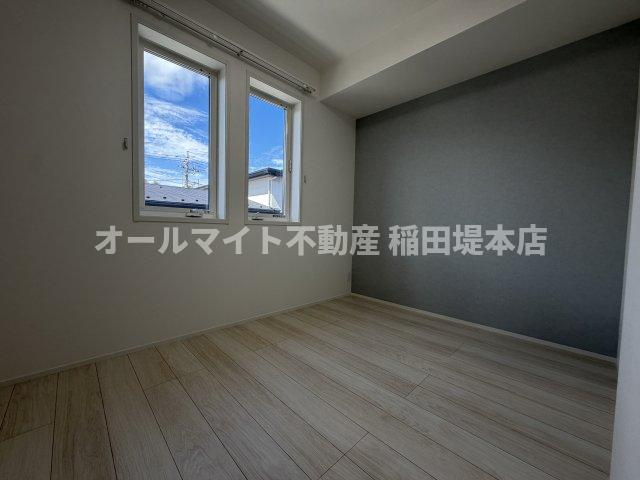 川崎市多摩区栗谷４丁目のアパートの居間・リビング