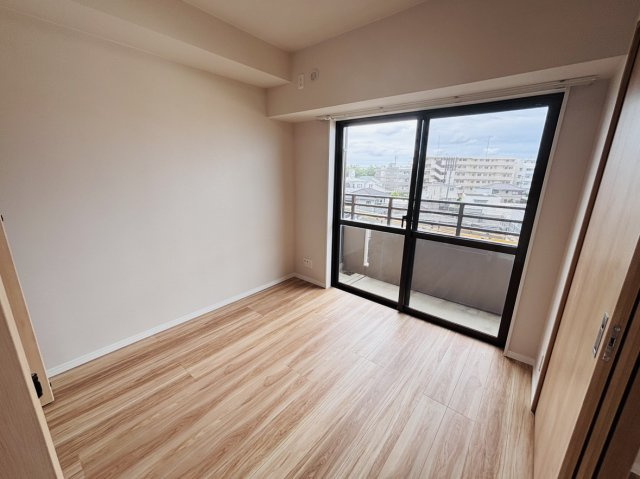 ライオンズヒルズ具志の洋室