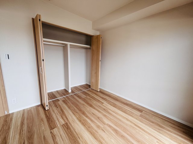 ライオンズヒルズ具志の洋室
