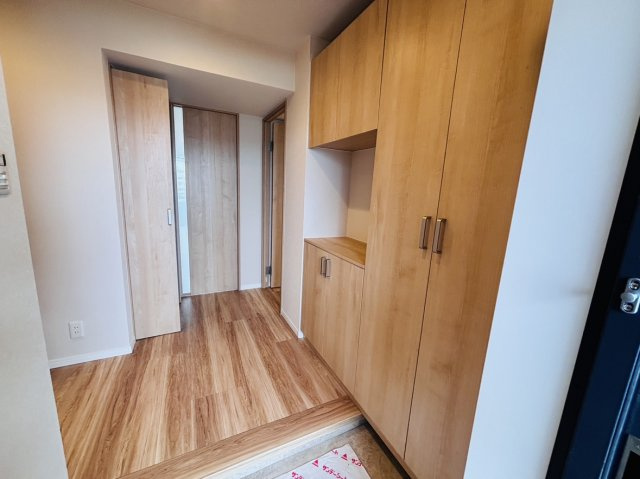 ライオンズヒルズ具志の玄関