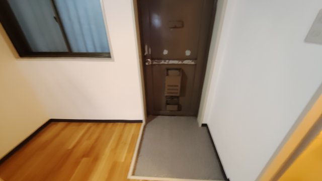 大石北町マンションの玄関