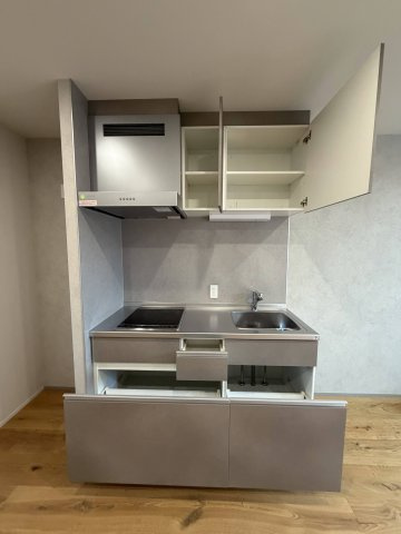 WELLNEST　ROOM　名駅南　B棟のキッチン|コンパクトなキッチンで掃除もラクラク