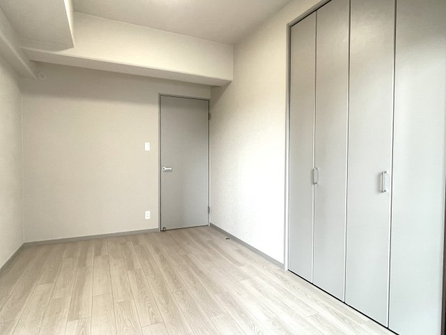 アーバンタワー麻里布の洋室