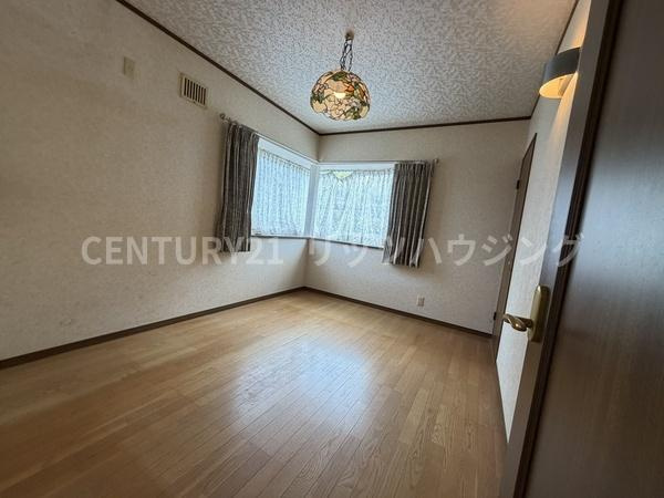 寝屋川市 成田南町　中古 一戸建ての洋室