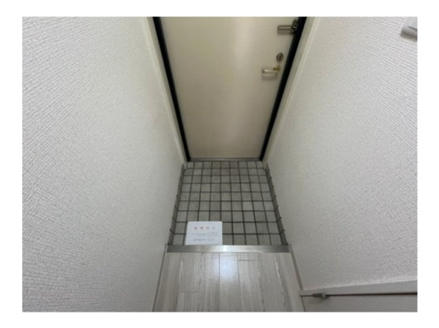 旭マンションの玄関