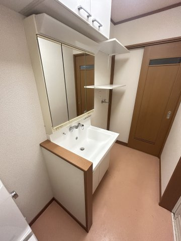松山１丁目貸家の洗面所