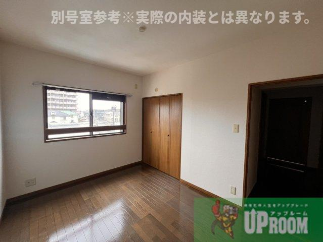 ハピネス八光の洋室